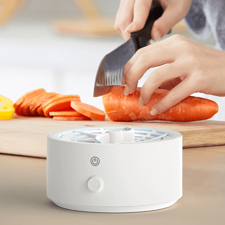 Compact fruit & vegetable purifier, a portable kitchen gadget for chemical-free food cleaning & healthy meals.