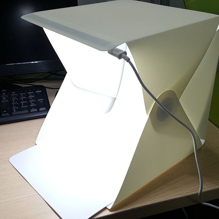 Compact LED light box for product photography. A foldable photo studio solution for professional-quality images.