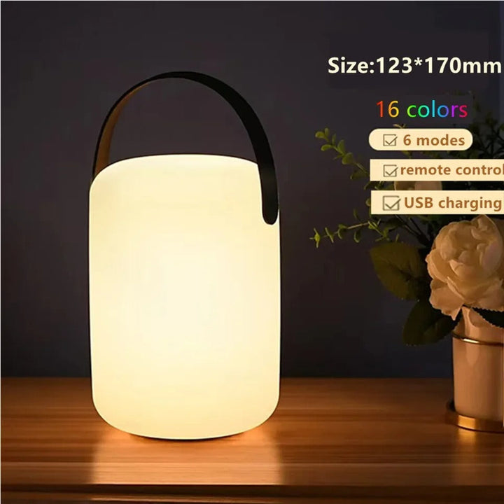 Portable waterproof cordless lamp with remote control, sleek modern design, suitable for indoor and outdoor lighting.