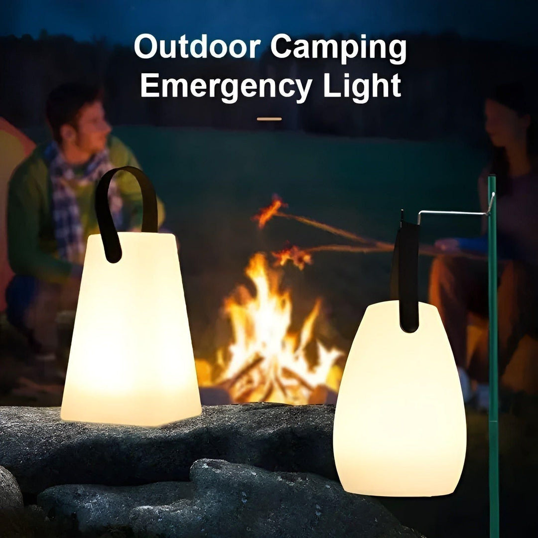 Portable waterproof cordless lamp with remote control, sleek modern design, suitable for indoor and outdoor lighting.