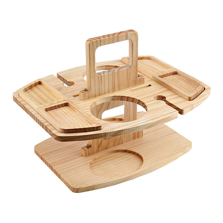 Foldable wooden picnic table for wine glasses & snacks. Ideal portable outdoor serving accessory.