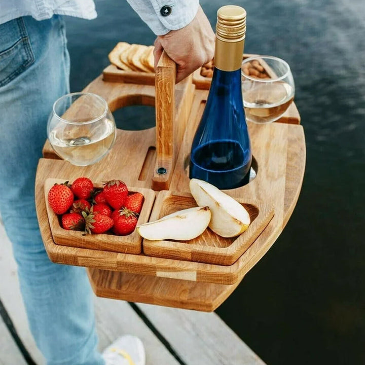 Elegant portable wooden picnic table. Foldable design for easy outdoor wine serving & snacking.