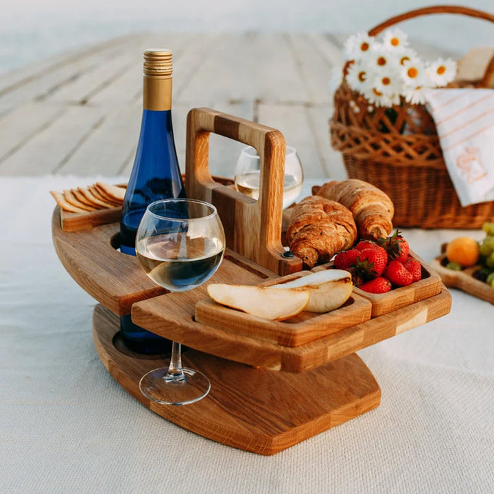 Stylish wooden foldable picnic wine table. Lightweight and portable for all your outdoor adventures.