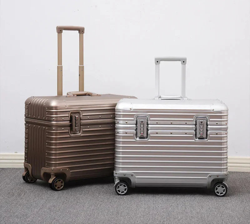 Large unisex aluminium-magnesium hard case suitcase, perfect for long-haul durable travel.