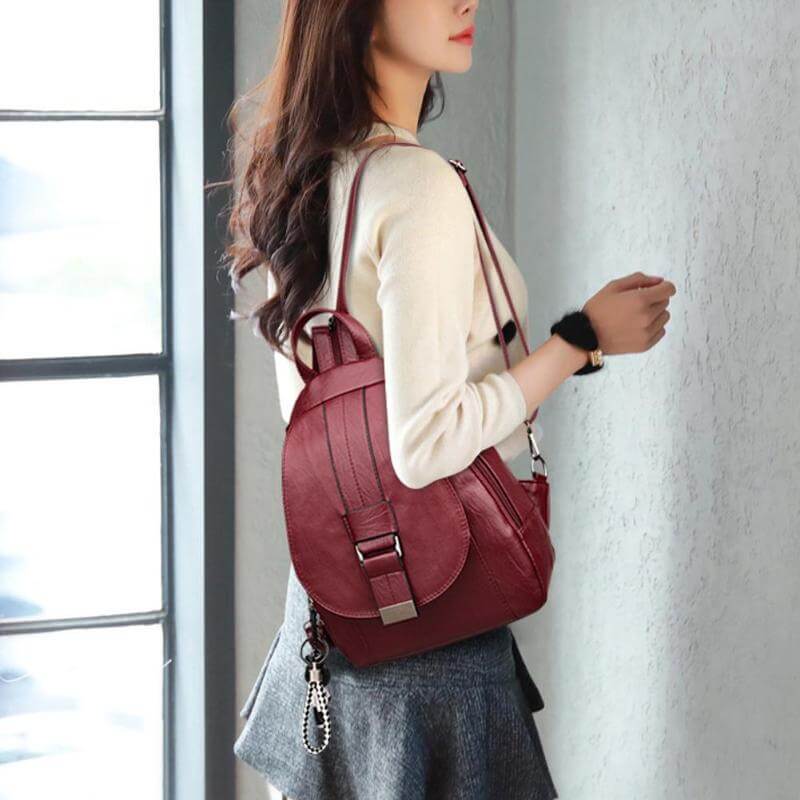 Women's water-resistant leather backpack, durable and stylish for daily urban use.