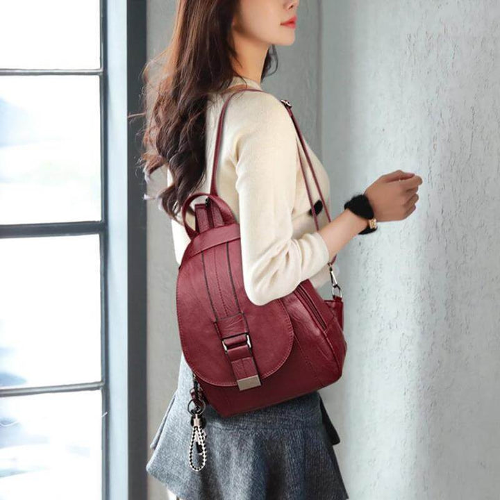 Women's water-resistant leather backpack, durable and stylish for daily urban use.