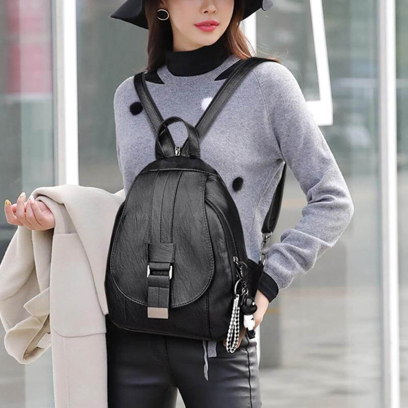 Anti-theft women's leather backpack, water-resistant, great for secure everyday carry.