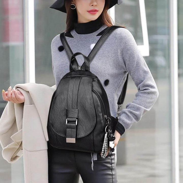 Anti-theft women's leather backpack, water-resistant, great for secure everyday carry.