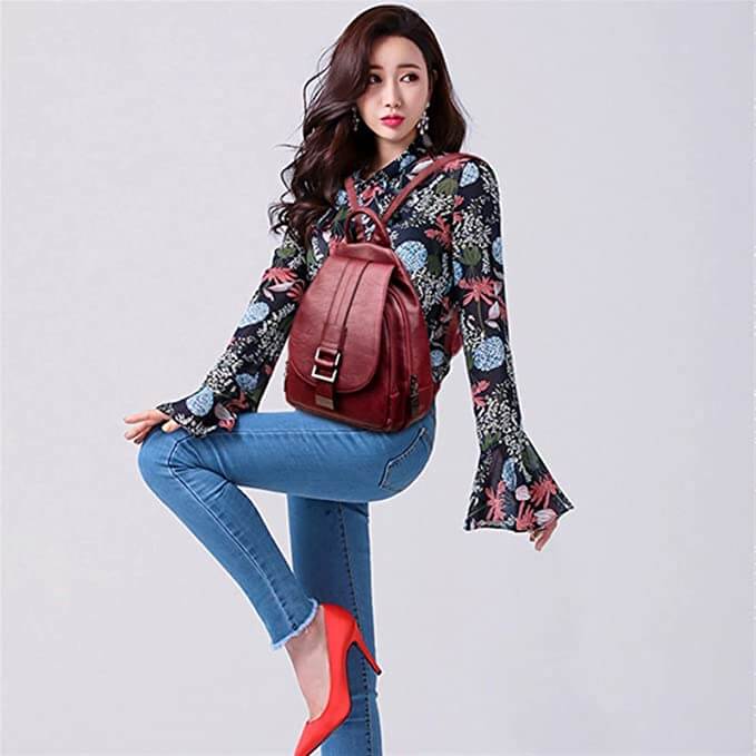Elegant women's leather travel backpack, water-resistant, combining fashion & function.