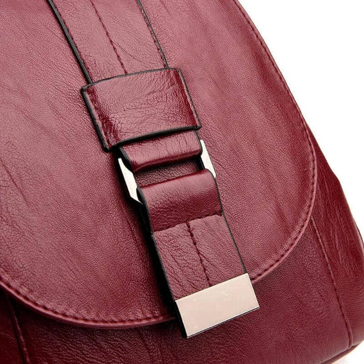 Travel-ready women's water-resistant leather backpack, anti-theft design for safety.
