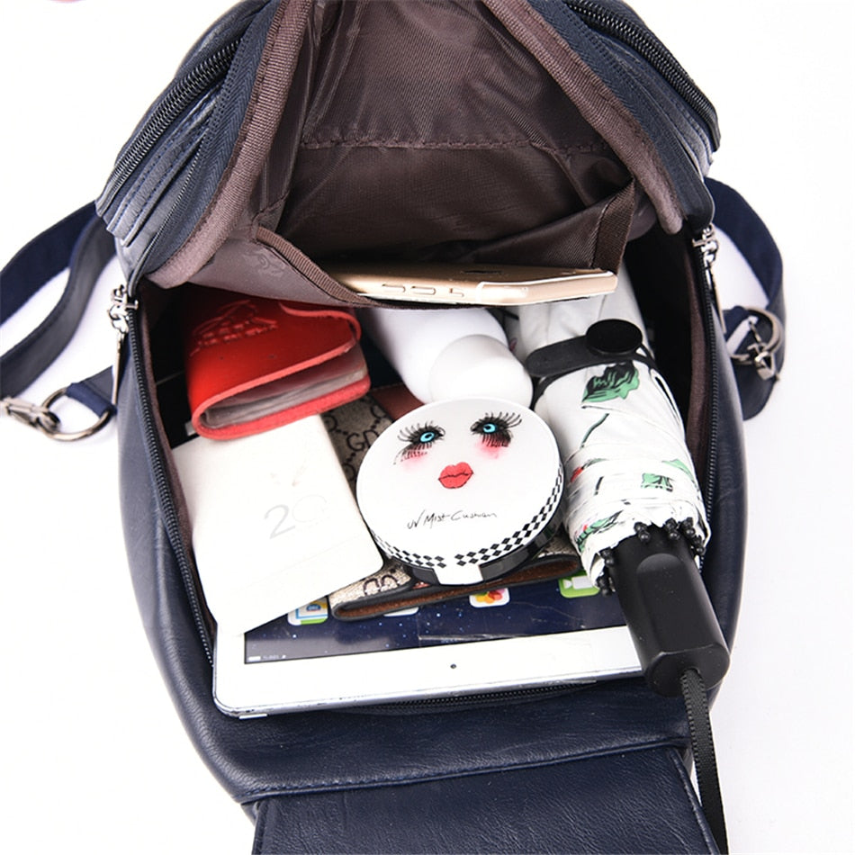 Versatile women's water-resistant leather bag, perfect for everyday and adventure.