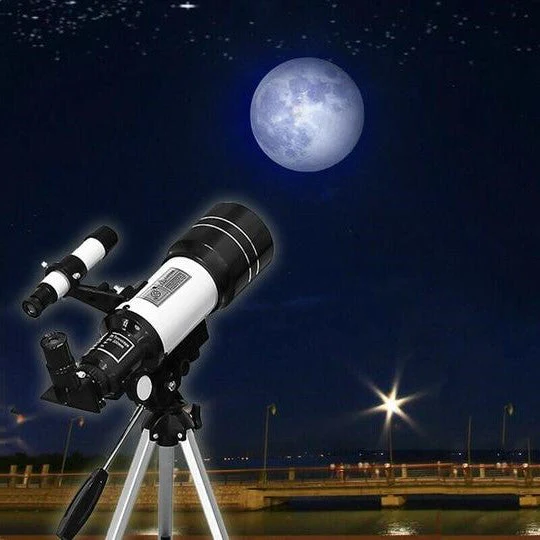 "Professional telescope with tripod for stargazing, featuring 70mm aperture, ideal for moon watching and celestial viewing."