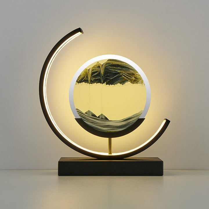 Quicksand art table lamp with rotating sand patterns, 360-degree rotation, elegant design, soft LED light, stress relief.