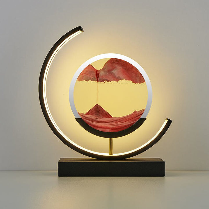 Quicksand art table lamp with rotating sand patterns, 360-degree rotation, elegant design, soft LED light, stress relief.