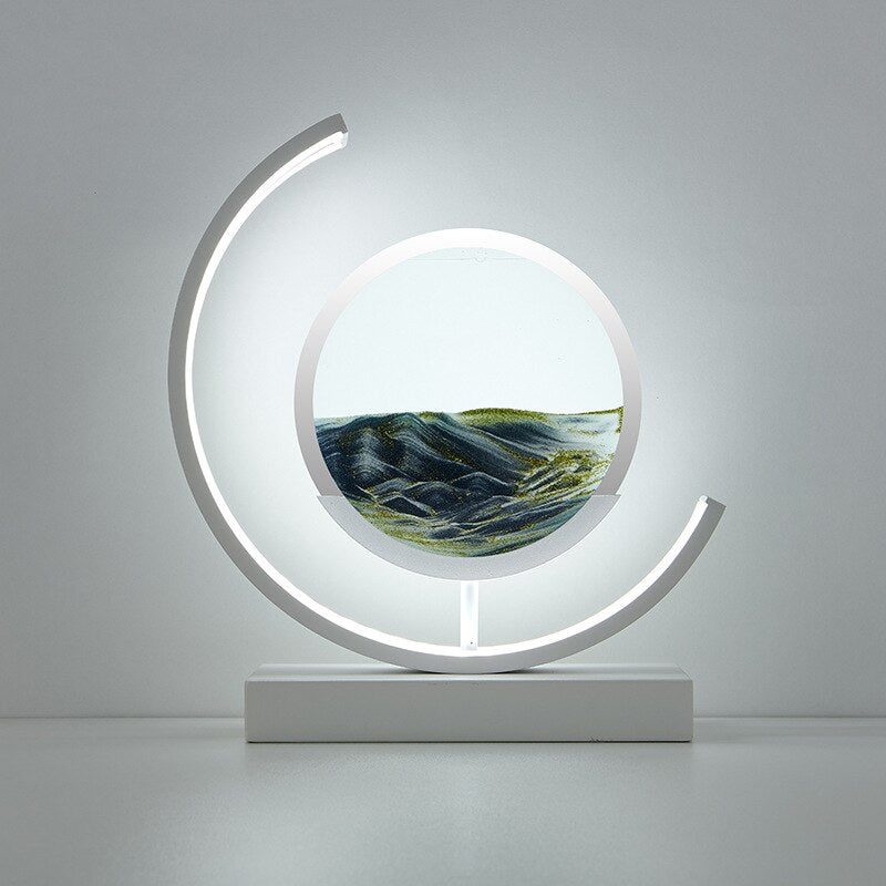 Quicksand art table lamp with rotating sand patterns, 360-degree rotation, elegant design, soft LED light, stress relief.