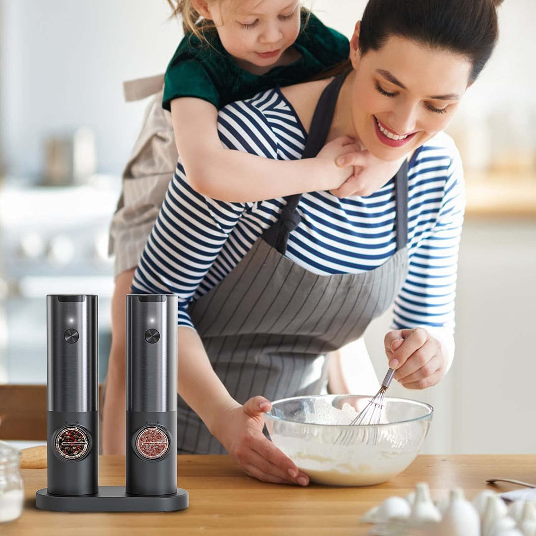 Elegant electric salt and pepper grinder set, rechargeable stainless steel spice mills for versatile seasoning.