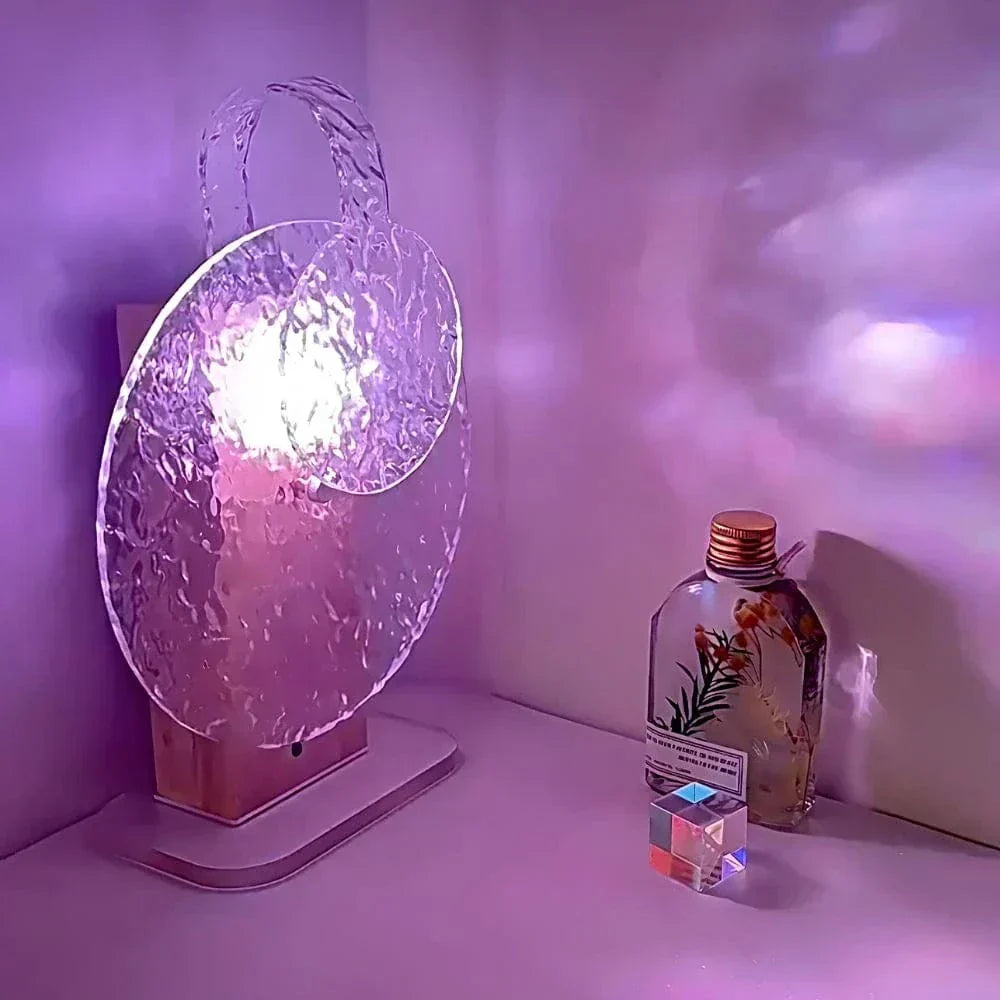 "Rechargeable LED lamp projects sunset hues, ocean waves; adds cozy ambiance to home decor with adjustable head."