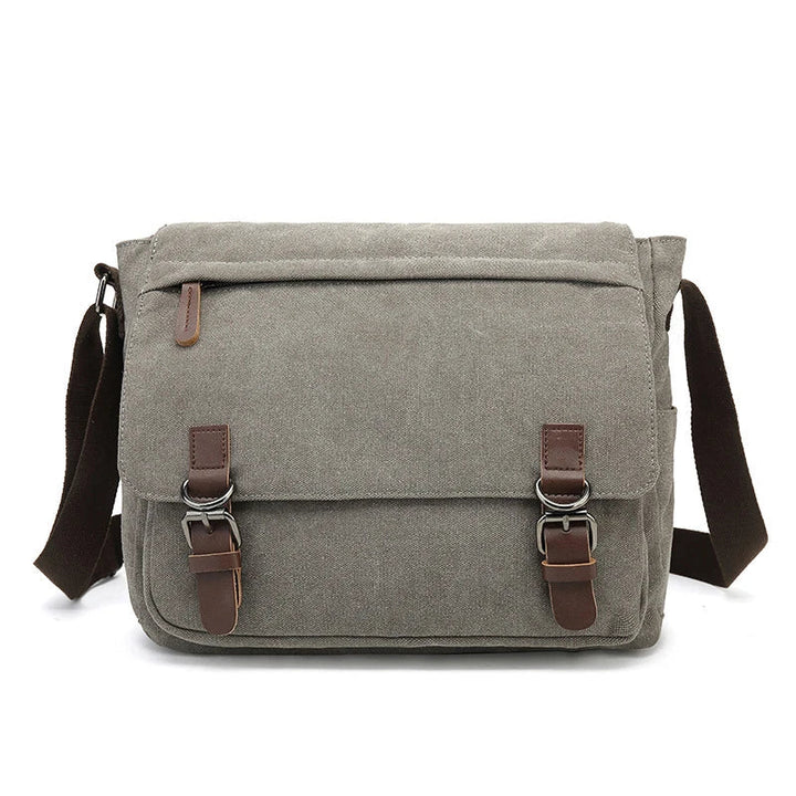 Rugged men's canvas shoulder bag with adjustable strap, front view showcasing durable material and stylish design.