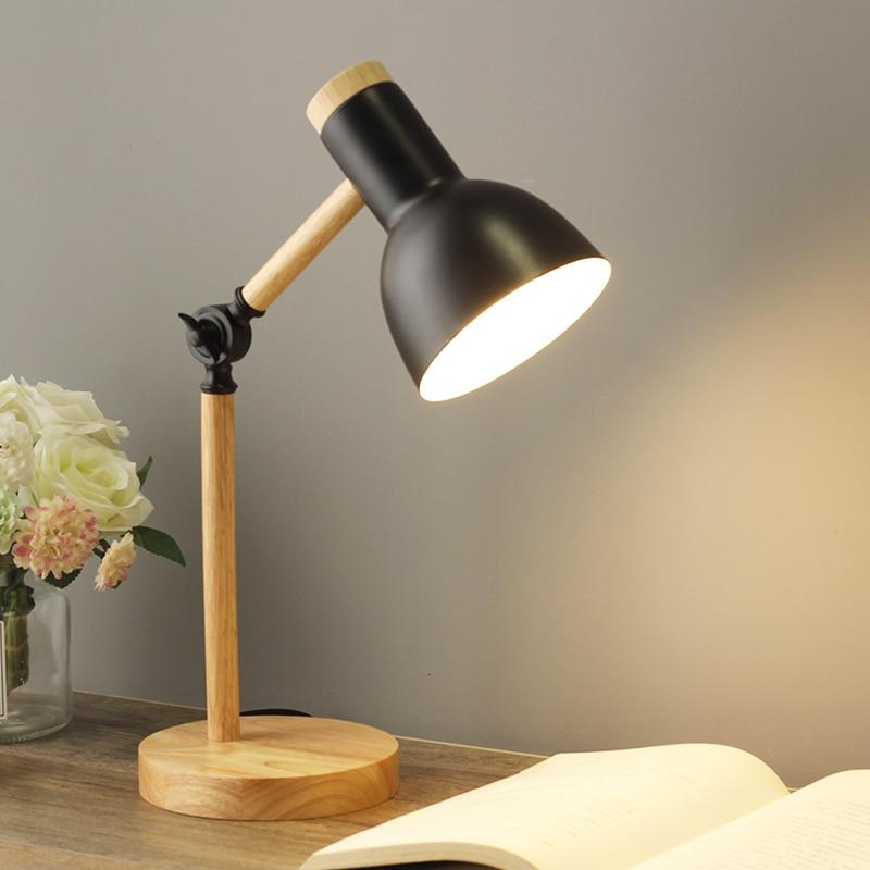 Scandinavian wooden desk lamp with foldable design, colorful shade, adjustable height, and sturdy base. Ideal for any decor.