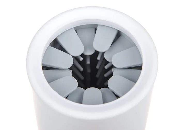 Gentle silicone paw cleaner for pets, featuring soft bristles for thorough cleaning. Portable and eco-friendly design, ideal for dogs and cats' sensitive paws.