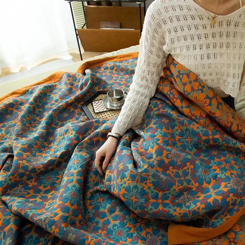 Decorative orange & blue patterned six-layer cotton quilt, perfect for modern bedroom home decor.