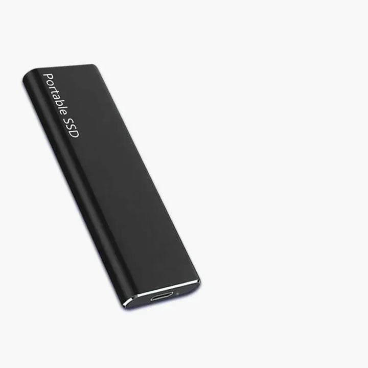 "Sleek 4TB USB-C external drive with slim metal casing, ideal for portable storage, compatible with PC and Mac."