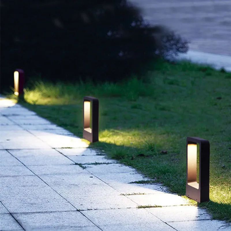 "Sleek aluminium outdoor garden light, weatherproof IP68 design, available in black or grey, enhances patios and pathways."