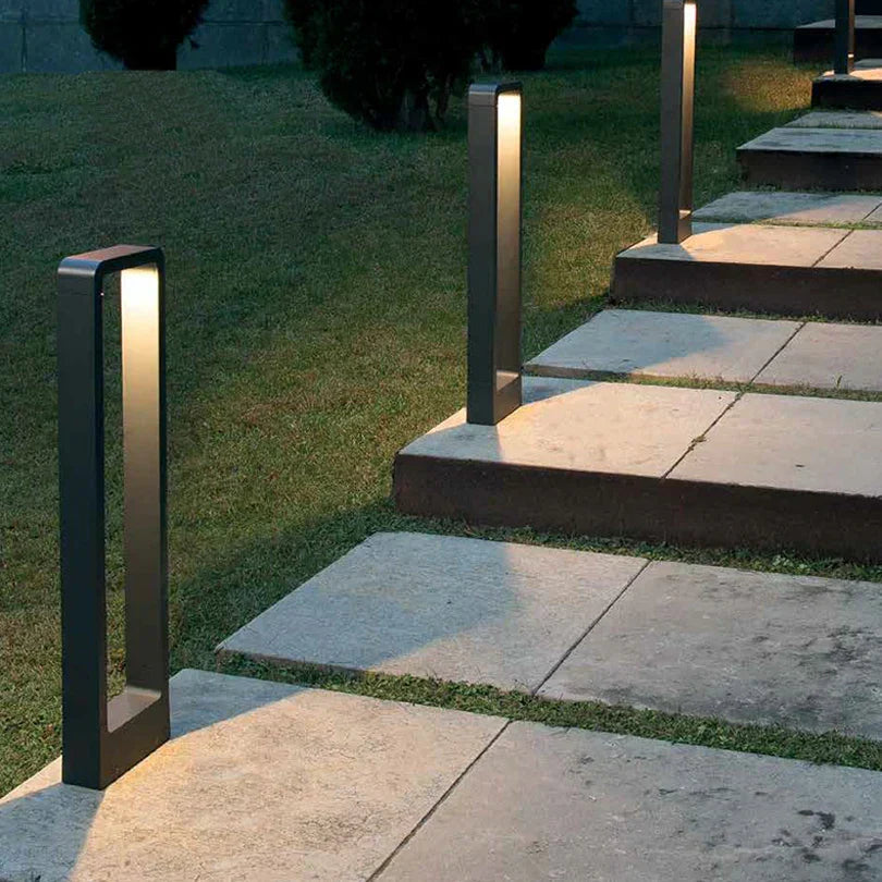 "Sleek aluminium outdoor garden light, weatherproof IP68 design, available in black or grey, enhances patios and pathways."