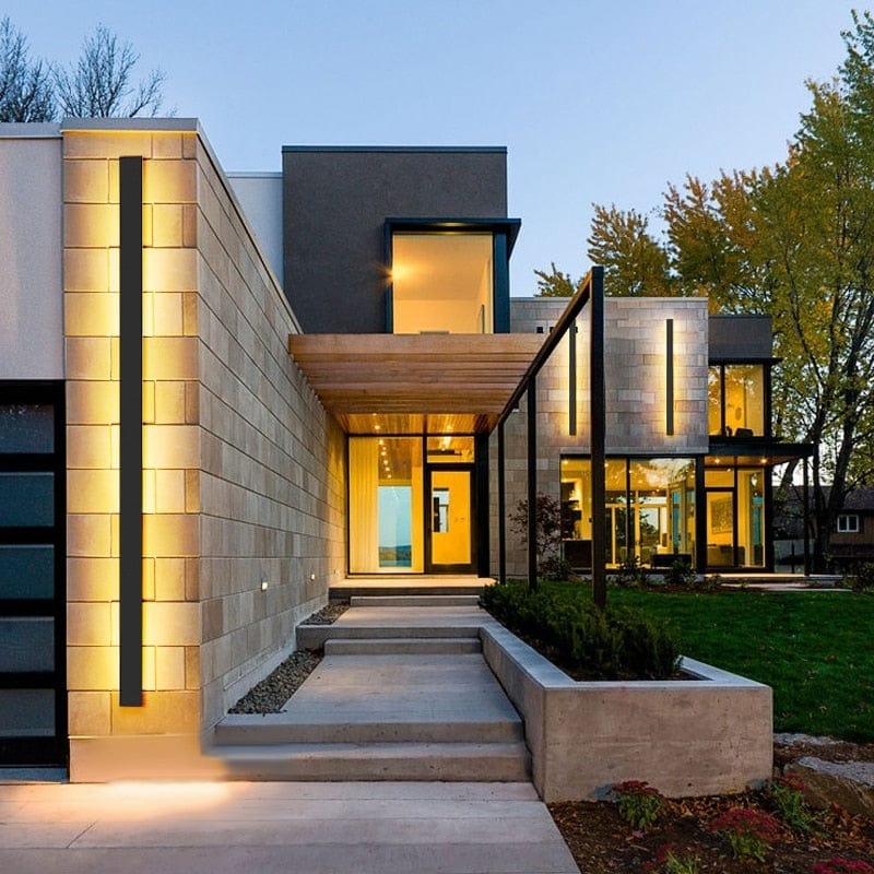 Sleek aluminium outdoor wall sconce with backlit design, ideal for modern patios; corrosion-resistant and stylish.