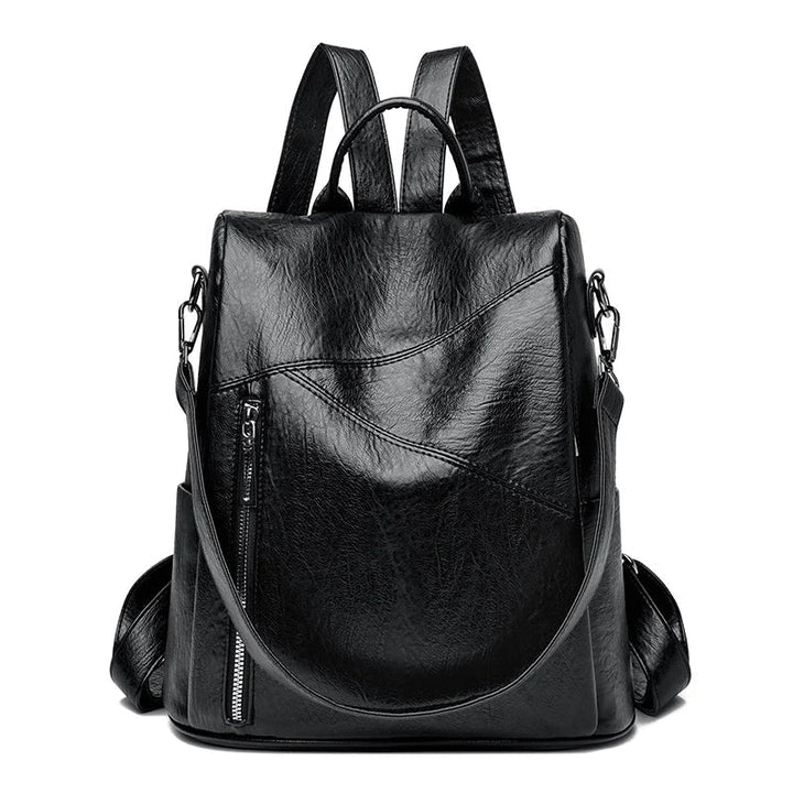 Stylish women's black leather travel backpack, a versatile fashion accessory.