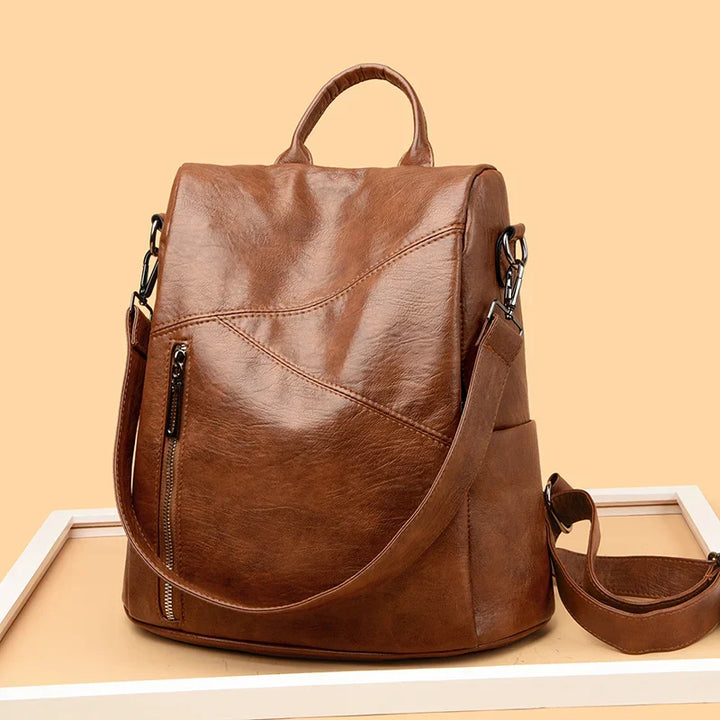 Versatile women's everyday leather backpack, designed for travel & urban exploration.