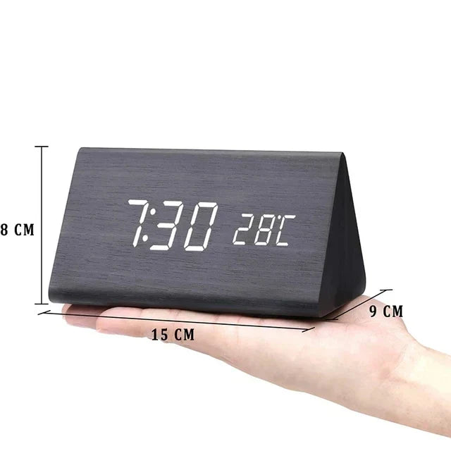 Sleek bedroom alarm clock, digital LED with voice control feature.