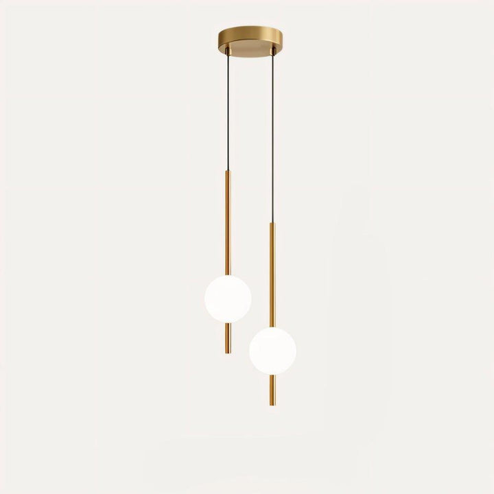 "Sleek glass ball Nordic pendant light with metal frame, LED bulb; available in black or brass, perfect for modern decor."