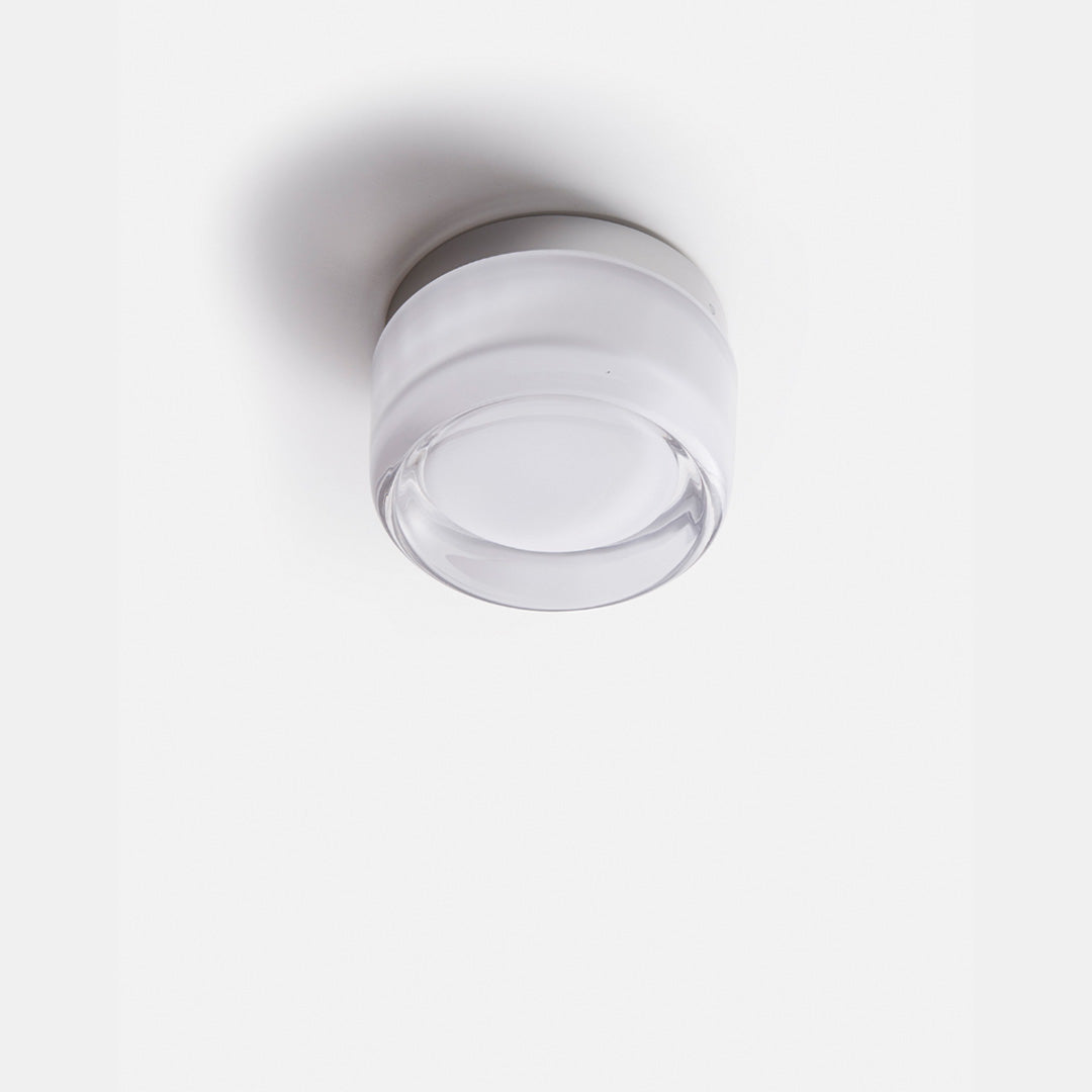 "Sleek wall mounted LED sconce light with acrylic and aluminum design, offering versatile decor enhancement for modern interi