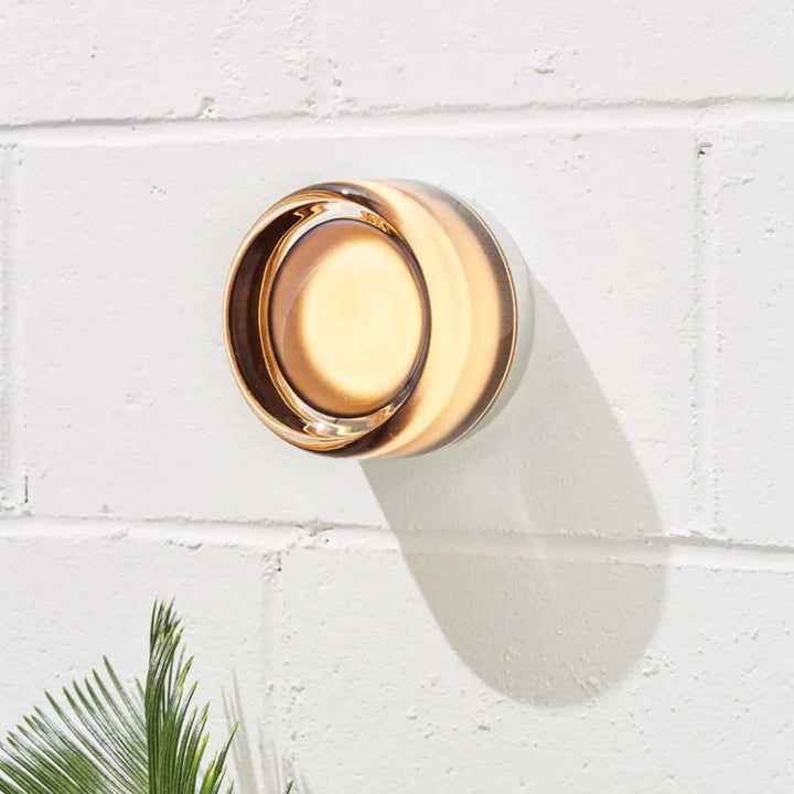 "Sleek wall mounted LED sconce light with acrylic and aluminum design, offering versatile decor enhancement for modern interi