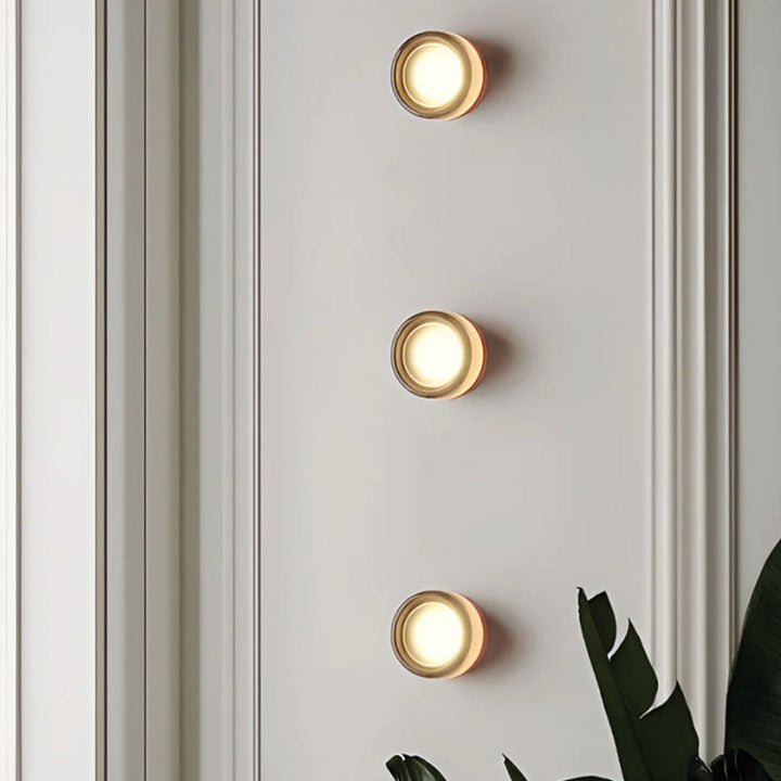 "Sleek wall mounted LED sconce light with acrylic and aluminum design, offering versatile decor enhancement for modern interi