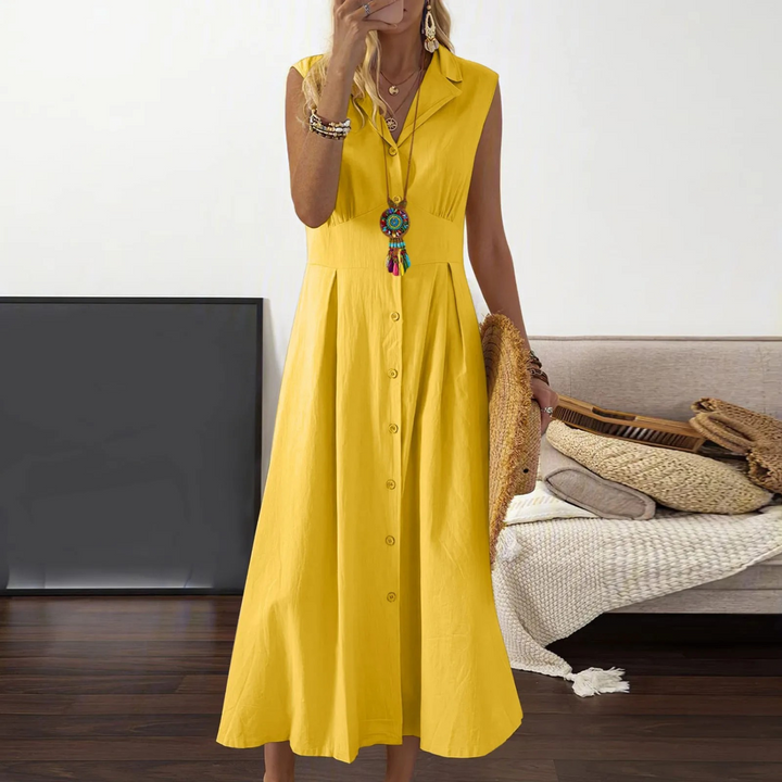 Sleeveless A-Line V-neck midi dress with collared neckline and button-down front, ideal for versatile, elegant styling.