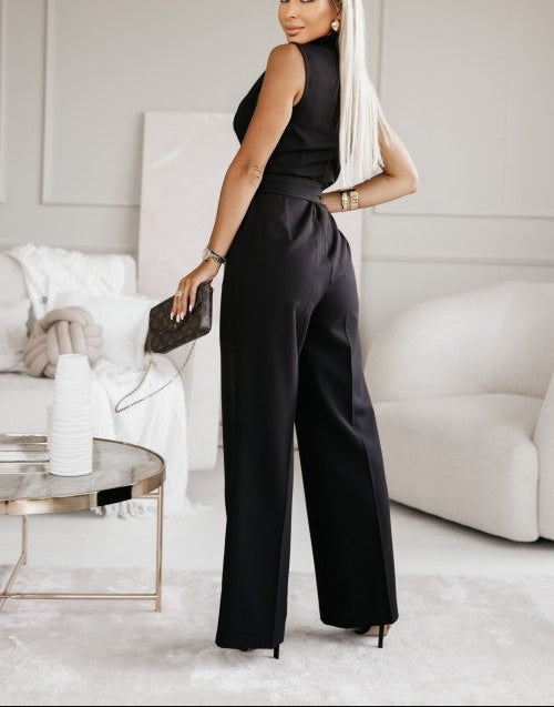 "Sleeveless wide-leg jumpsuit for women in black and pink with wrap design, perfect for versatile elegant occasions."