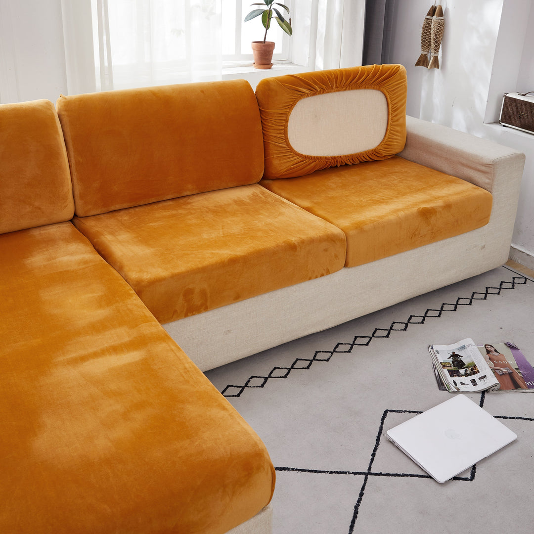 "Smoke velvet sectional sofa cover, snug fit, enhances decor, protects against stains and wear, ideal for pet-friendly homes.