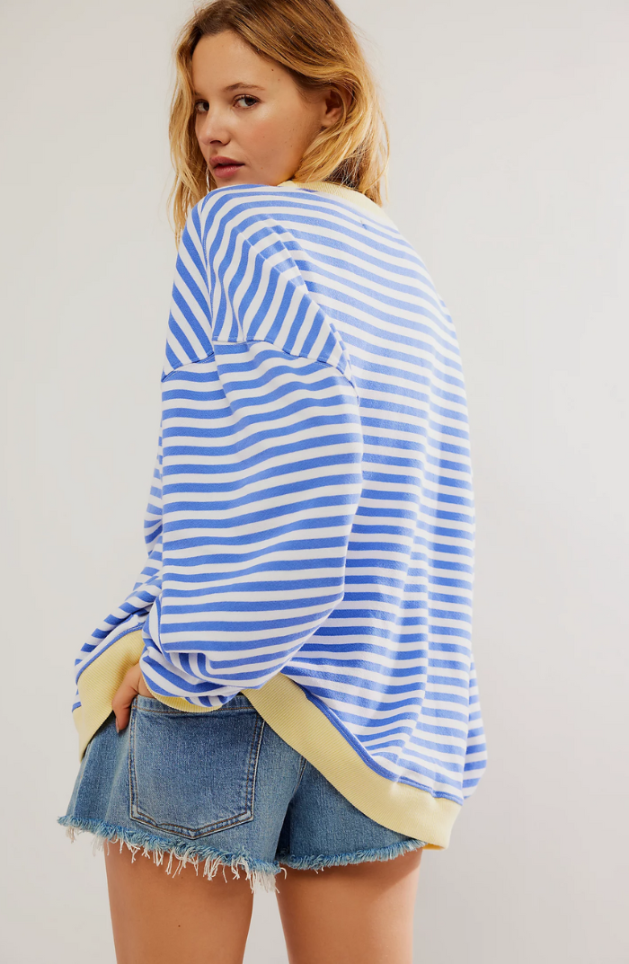 "Soft women's striped crewneck sweater, high-quality material, timeless design, versatile fashion for casual wear."