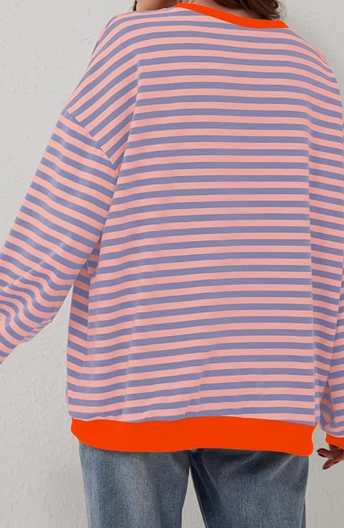 "Soft women's striped crewneck sweater, high-quality material, timeless design, versatile fashion for casual wear."