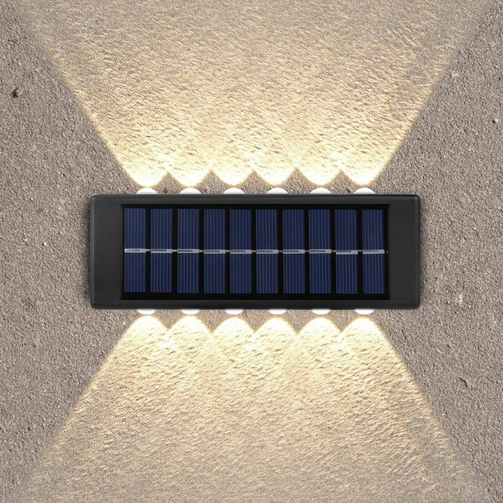 Solar LED Outdoor Wall Light, IP65 waterproof, warm white glow, durable ABS, eco-friendly for gates, doorways, patios.