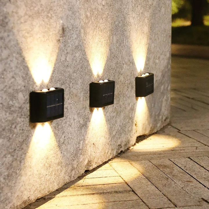 Solar LED Outdoor Wall Light, IP65 waterproof, warm white glow, durable ABS, eco-friendly for gates, doorways, patios.