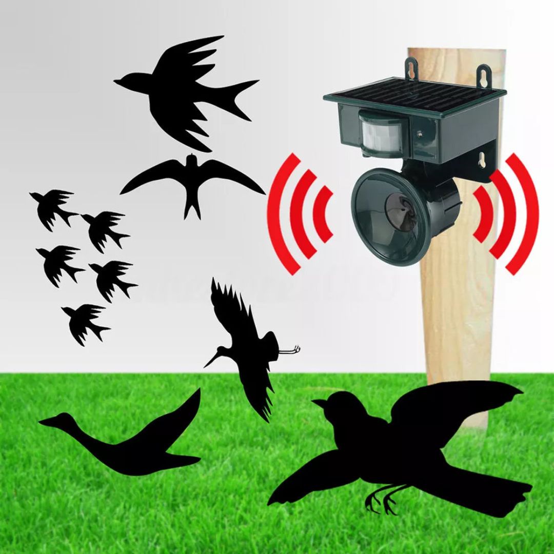 "Solar-powered motion sensor bird repeller, green and gray, for eco-friendly outdoor pest control in gardens and patios."