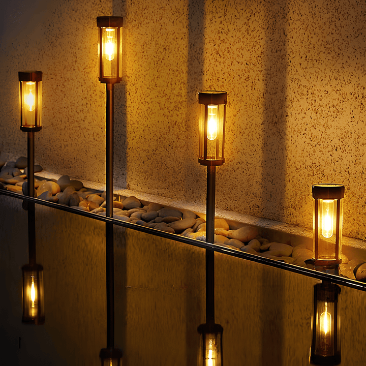 Solar-powered waterproof garden torch with flickering glow, decorative design, illuminating gardens, patios, and pathways.