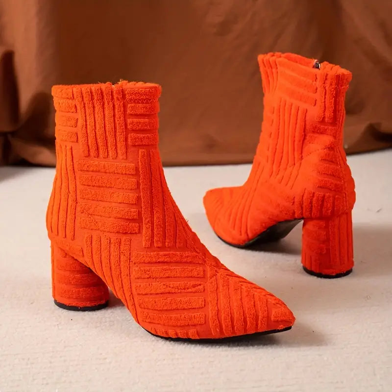 Solid Selene women's ankle boots, pointed toe, & stable block heel. Fashionable zipper boots for everyday style.