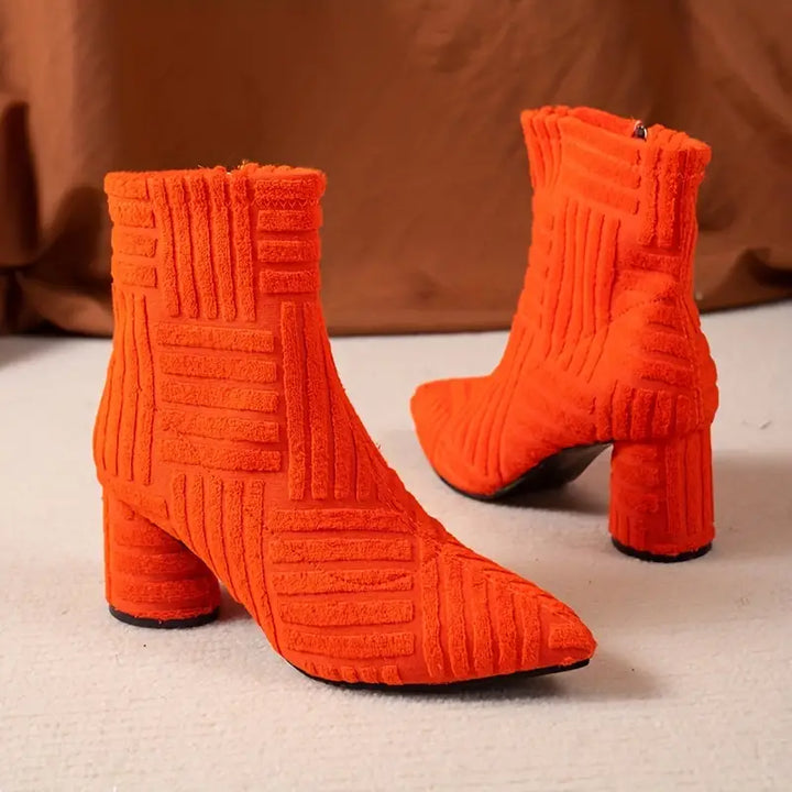Solid Selene women's ankle boots, pointed toe, & stable block heel. Fashionable zipper boots for everyday style.