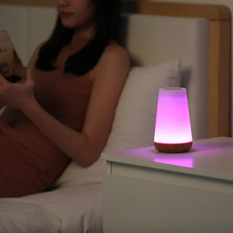 Magical LumiSeren mood light, USB rechargeable, creating a soothing ambiance with touch control for any room.
