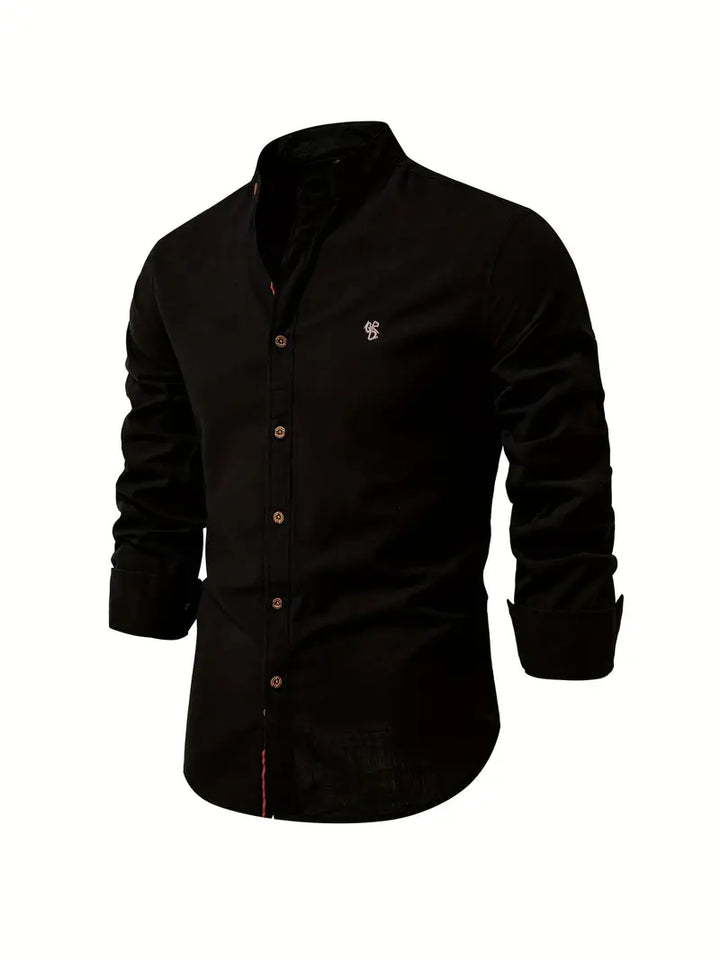 Detail shot of a men's long-sleeve button-up shirt, highlighting the fabric, buttons, and collar for spring style.