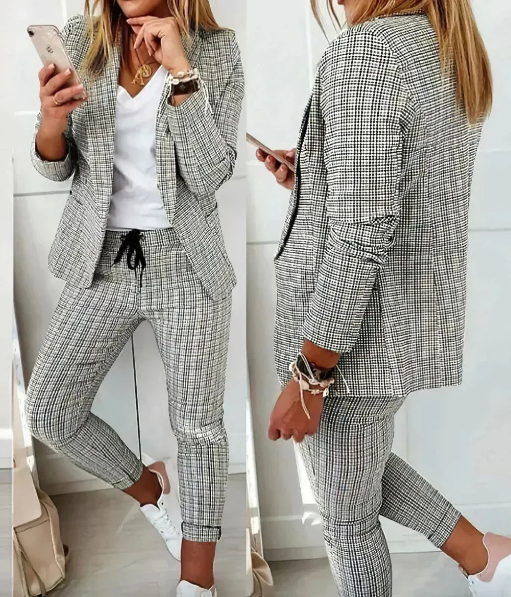 Women's sophisticated business suit, a versatile two-piece blazer and pants set for professional workwear.